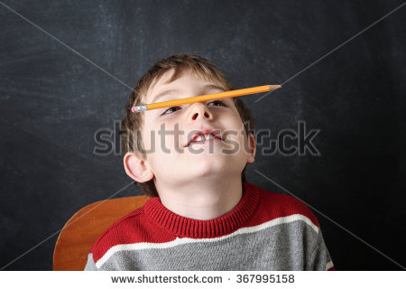 stock-photo-young-bored-boy-balancing-a-pencil-on-his-nose-367995158